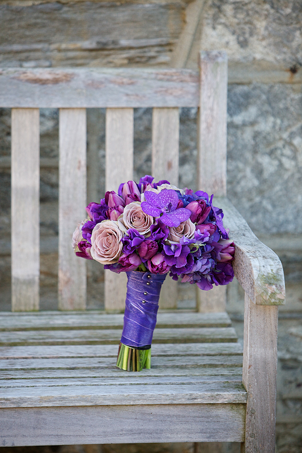 purple bouquet on a bench - wedding photo by top Philadelphia based wedding photographers Langdon Photography